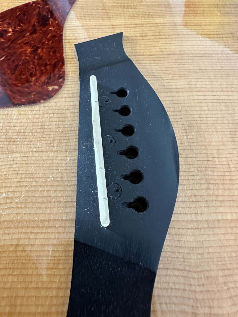 Acoustic guitar setup, lowering the action, saddle replacement